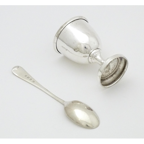 403 - A cased silver egg cup and spoon, hallmarked Birmingham 1939 maker Arthur Price & Co Ltd.