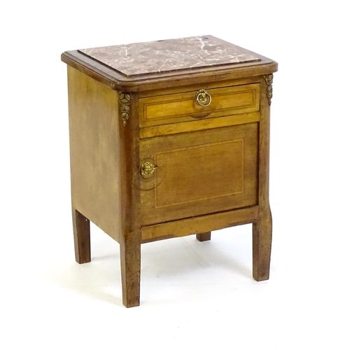 1435 - A late 19thC marble topped cabinet, with a rouge marble top above a small drawer and panelled cupboa... 