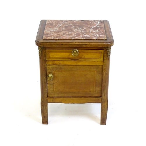 1435 - A late 19thC marble topped cabinet, with a rouge marble top above a small drawer and panelled cupboa... 