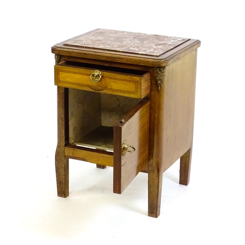 1435 - A late 19thC marble topped cabinet, with a rouge marble top above a small drawer and panelled cupboa... 