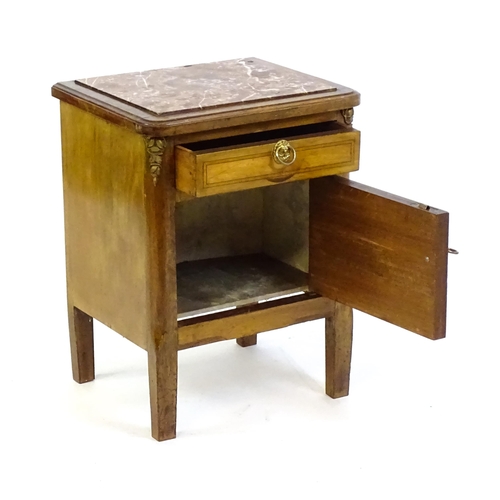 1435 - A late 19thC marble topped cabinet, with a rouge marble top above a small drawer and panelled cupboa... 