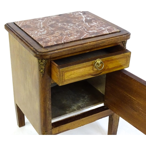 1435 - A late 19thC marble topped cabinet, with a rouge marble top above a small drawer and panelled cupboa... 