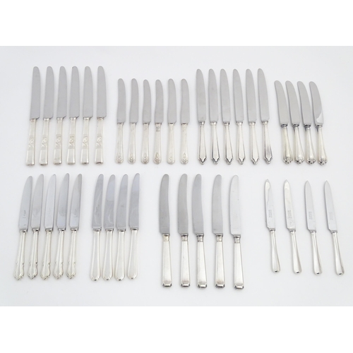 623 - A quantity of assorted silver plate flatware  / cutlery to include various knives, makers to include... 