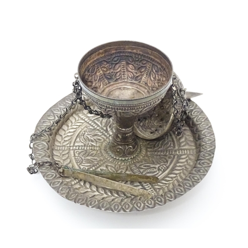 625 - A Middle Eastern white metal pedestal incense burner on a circular base, marked OMAN under. Together... 