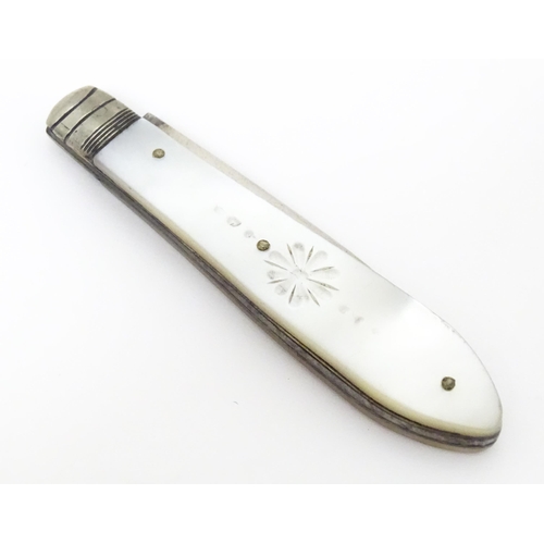 411 - A Victorian silver folding fruit knife with mother of pearl handle, hallmarked Sheffield 1896 maker ... 