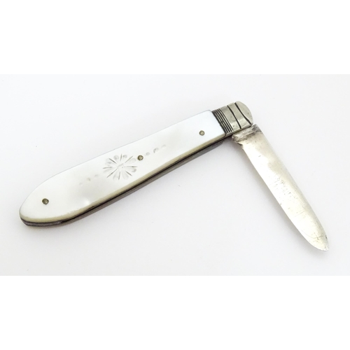 411 - A Victorian silver folding fruit knife with mother of pearl handle, hallmarked Sheffield 1896 maker ... 