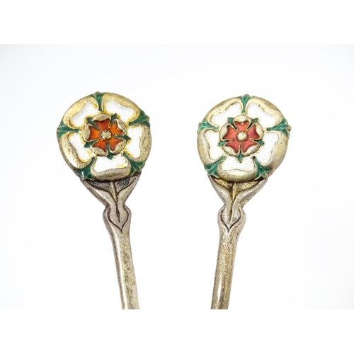 418 - Two silver spoons with English Rose enamel detail to handles and engraved England to bowl, hallmarke... 