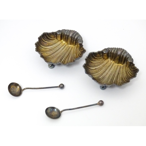 442 - A cased pair of silver salts of scallop shell form, and a pair of silver salt spoons hallmarked Birm... 