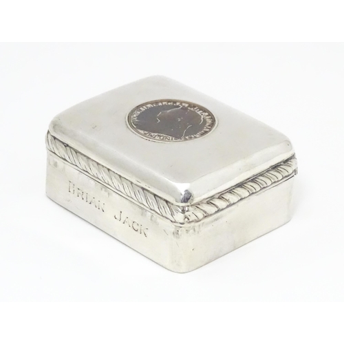 456 - A Victorian silver snuff box with Victorian coin to lid, hallmarked Birmingham 1900 maker Cornelius ... 