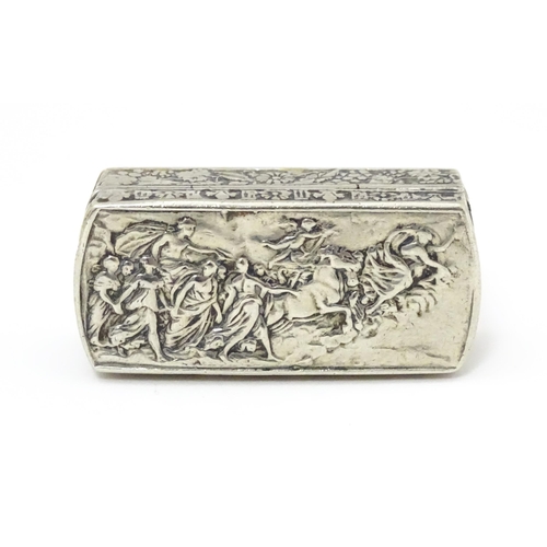 457 - An Italian white metal pill box of rectangular form with embossed decoration. Marked Italy under. Ap... 