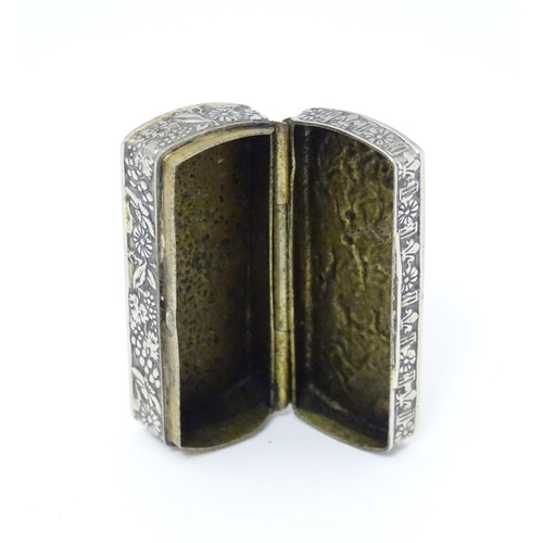 457 - An Italian white metal pill box of rectangular form with embossed decoration. Marked Italy under. Ap... 