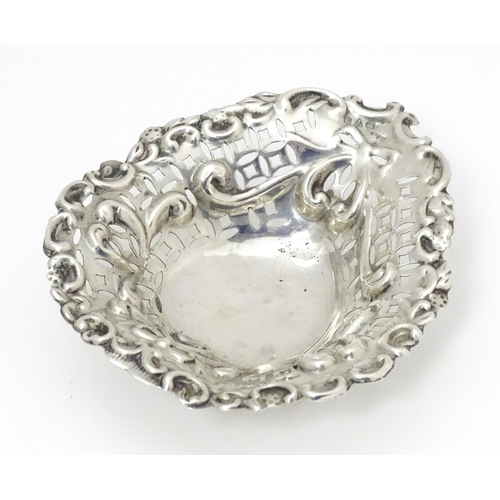 482 - A silver bonbon dish of stylised heart form with pierced and embossed decoration, hallmarked Chester... 