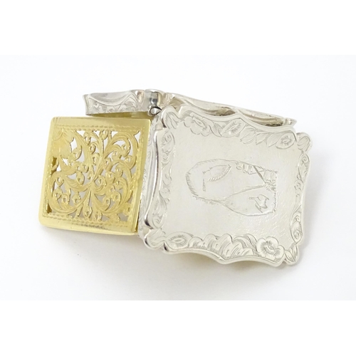 483 - A Victorian silver vinaigrette with engraved scene under depicting birds, hallmarked Birmingham 1843... 