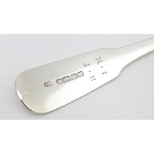 495 - A Geo III silver Fiddle pattern serving spoon, hallmarked Exeter 1825, maker Joseph Hicks. Approx. 9... 