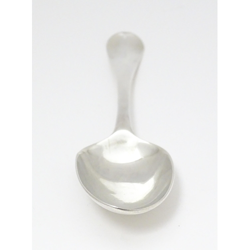 503 - A Geo II Hanoverian silver double drop heel tablespoon, hallmarked London 1741. Approx. 8