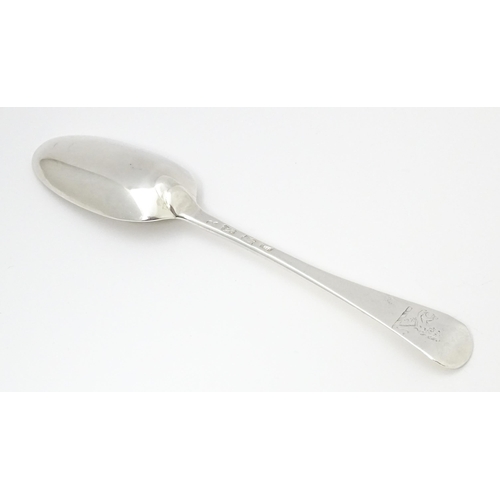 503 - A Geo II Hanoverian silver double drop heel tablespoon, hallmarked London 1741. Approx. 8