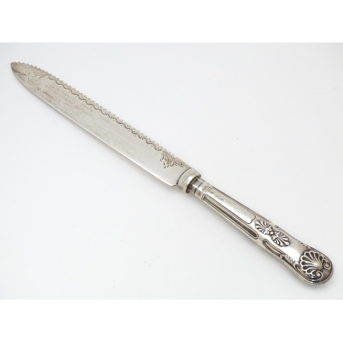 506 - Assorted silver items to include a silver handled cake knife, an American silver sauce ladle, variou... 