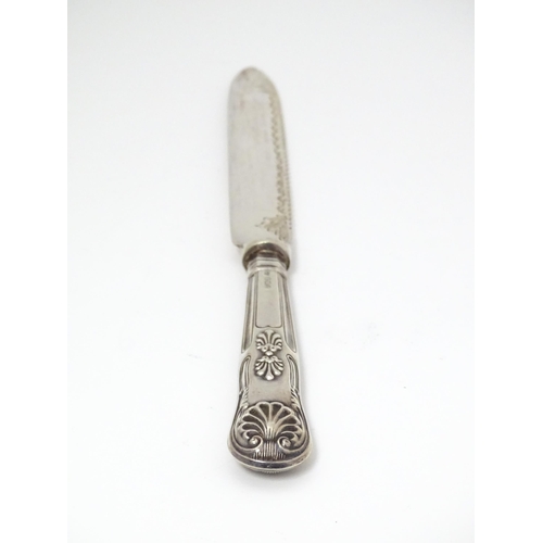 506 - Assorted silver items to include a silver handled cake knife, an American silver sauce ladle, variou... 