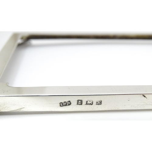 598 - A silver photograph frame surround, hallmarked Birmingham 1920 maker E F Braham Ltd (Edward Foligne ... 