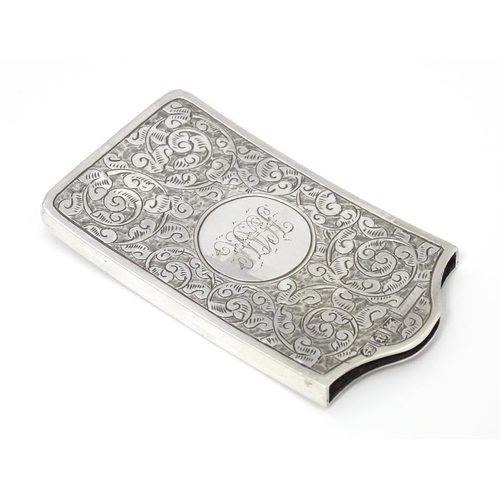 445 - A Victorian silver card case with engraved acanthus scroll detail, hallmarked Birmingham 1894, maker... 