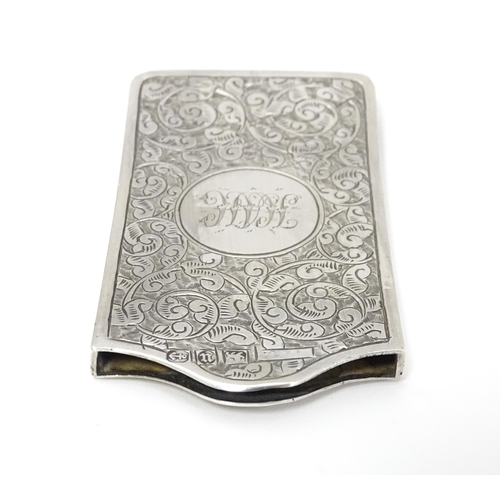 445 - A Victorian silver card case with engraved acanthus scroll detail, hallmarked Birmingham 1894, maker... 