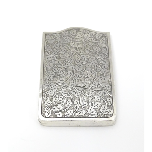 445 - A Victorian silver card case with engraved acanthus scroll detail, hallmarked Birmingham 1894, maker... 