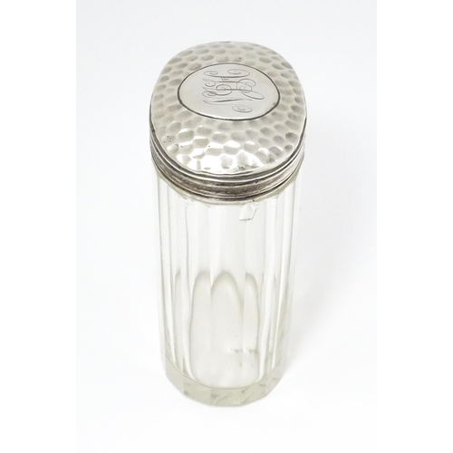 470 - A glass dressing table jar with silver lid hallmarked London 1093 maker William Amaziah Ellwick.  Ap... 