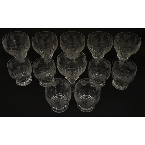 262A - Assorted drinking glasses with etched hop and fruiting vine decoration, to include pedestal wine gla... 