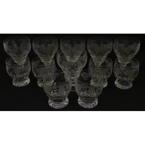 262A - Assorted drinking glasses with etched hop and fruiting vine decoration, to include pedestal wine gla... 