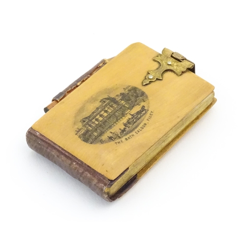 1180 - A 19thC Mauchline ware aide de memoire / notebook with miniature pencil, the vignette depicting The ... 