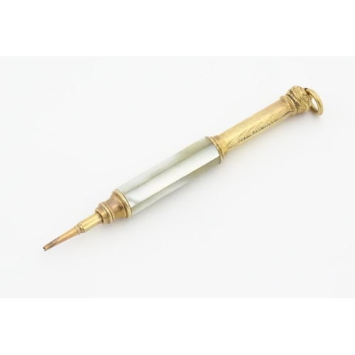 1182 - A Victorian gilt metal propelling pencil with mother of pearl detail. Marked Pearl Pat. Mar. 8 81. A... 