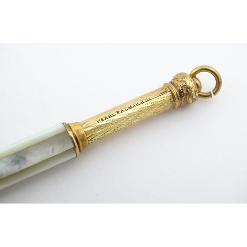 1182 - A Victorian gilt metal propelling pencil with mother of pearl detail. Marked Pearl Pat. Mar. 8 81. A... 