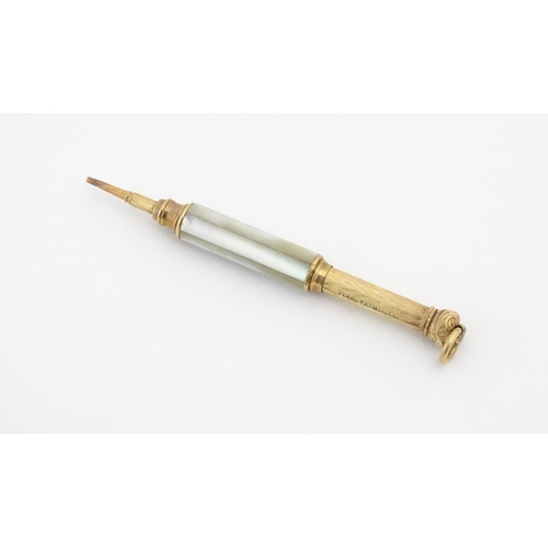 1182 - A Victorian gilt metal propelling pencil with mother of pearl detail. Marked Pearl Pat. Mar. 8 81. A... 