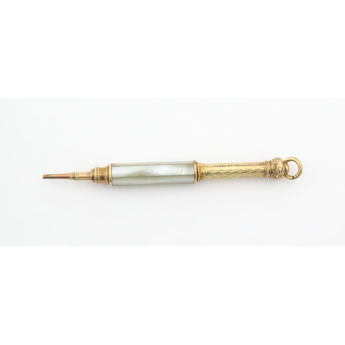 1182 - A Victorian gilt metal propelling pencil with mother of pearl detail. Marked Pearl Pat. Mar. 8 81. A... 