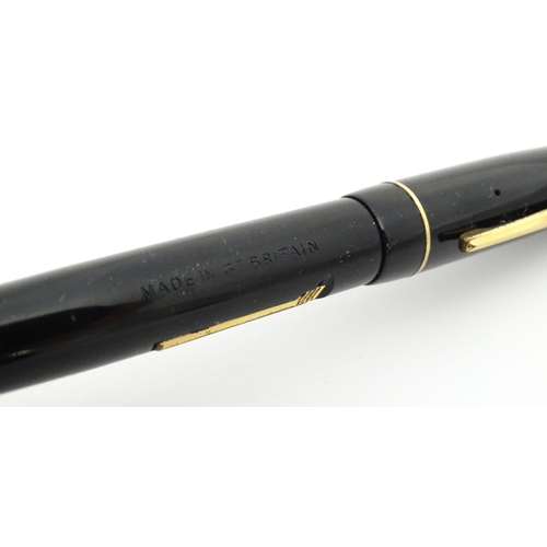 1185 - Five 20thC fountain pens, comprising a Dickinson 'The Croxley Pen' with 14K gold nib, together with ... 