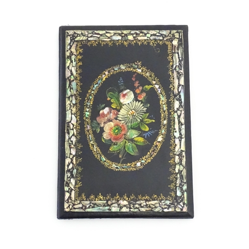 1194 - A Victorian lacquered papier mache desk blotter with hand painted floral decoration and inlaid abalo... 