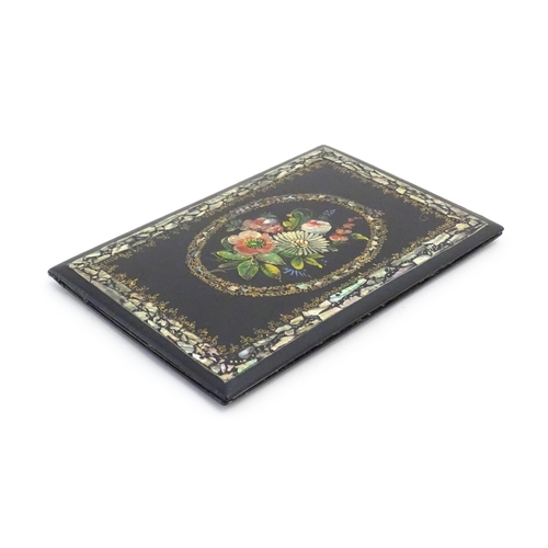 1194 - A Victorian lacquered papier mache desk blotter with hand painted floral decoration and inlaid abalo... 