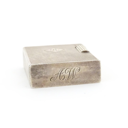 1197 - A cased Art Deco style silver pocket lighter with engine turned decoration, hallmarked 1950 London M... 