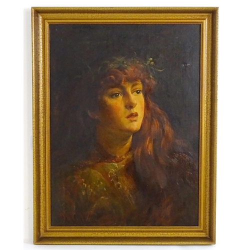 Joseph Kirkpatrick (1872-1930), Oil on canvas, Ophelia, A Pre-Raphaelite portrait of a young woman with a foliate crown and long, flowing red hair. Signed and dated 1899 lower left. Approx. 21" x 15 1/2"