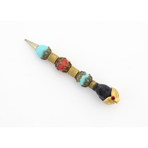 1183 - A propelling pencil with blackamoor and turquoise bead detail. Stamped Florenza. Approx. 4