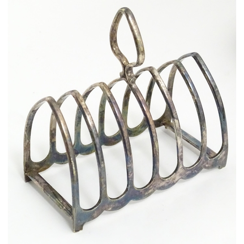 629 - A quantity of 19thC and later silver plated wares to include toast rack, entree dishes, cake forks, ... 