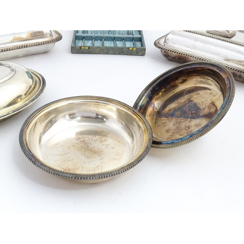 629 - A quantity of 19thC and later silver plated wares to include toast rack, entree dishes, cake forks, ... 