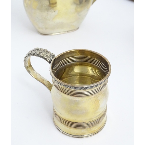 635 - A quantity of Old Sheffield Plate and silver plated wares to include chamber sticks, tankards, cream... 