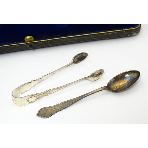 638 - A cased set of twelve silver plate teaspoons with sugar tongs en suite. The case marked Jeweller & W... 