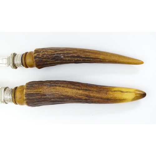 639 - A cased set of antler handled steak knives and forks. Retailed by Fortnum & Mason. Together with ant... 