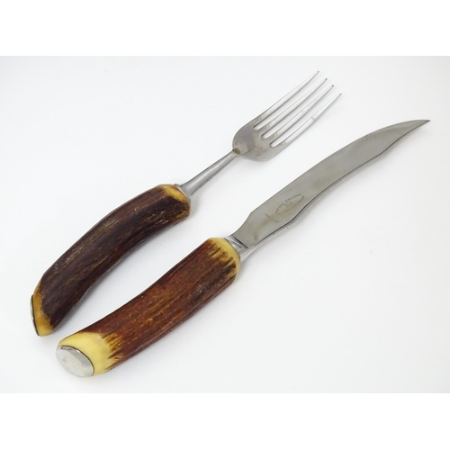 639 - A cased set of antler handled steak knives and forks. Retailed by Fortnum & Mason. Together with ant... 