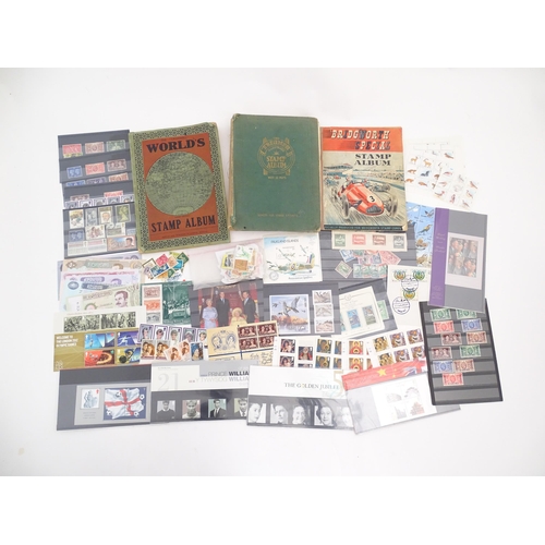 2000 - A 'Cromwell World's Stamp Album', containing a quantity of British and worldwide postage stamps, tog... 