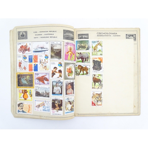 2000 - A 'Cromwell World's Stamp Album', containing a quantity of British and worldwide postage stamps, tog... 