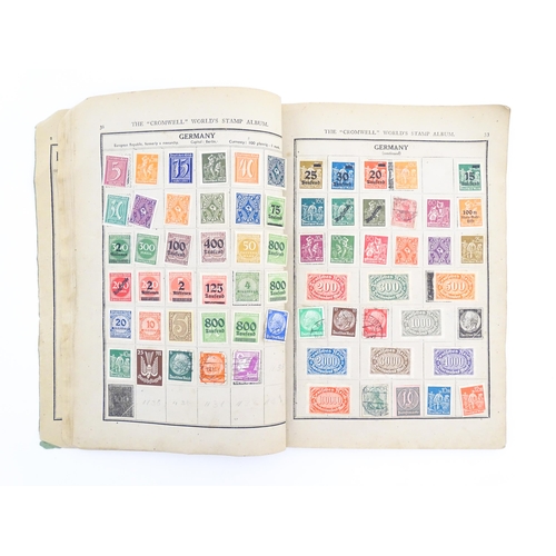 2000 - A 'Cromwell World's Stamp Album', containing a quantity of British and worldwide postage stamps, tog... 