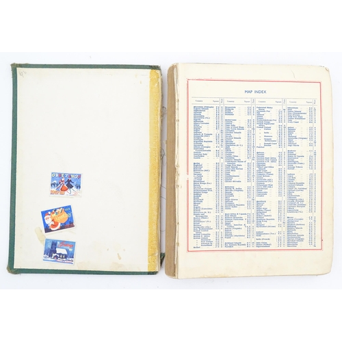 2000 - A 'Cromwell World's Stamp Album', containing a quantity of British and worldwide postage stamps, tog... 